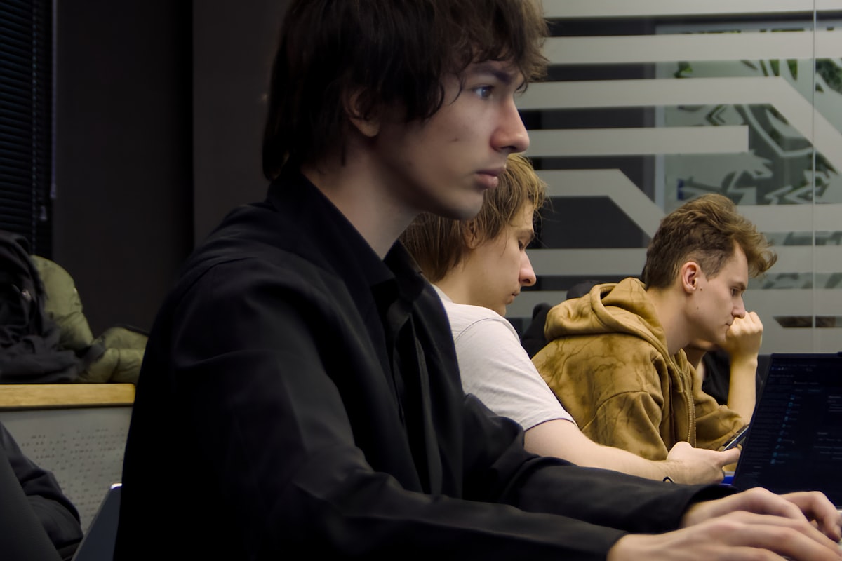 Students at coding bootcamp learning programming