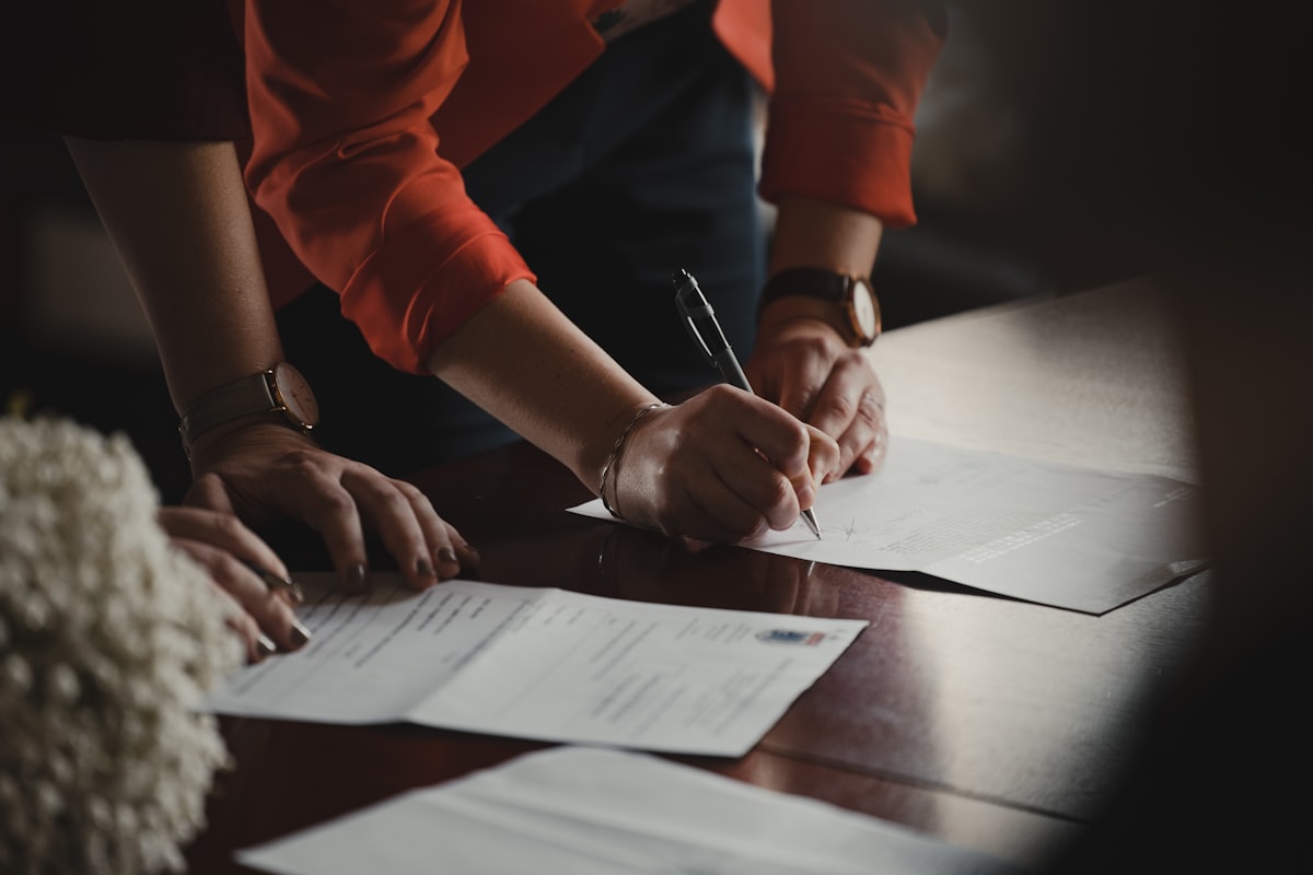 Person reading a lease agreement document