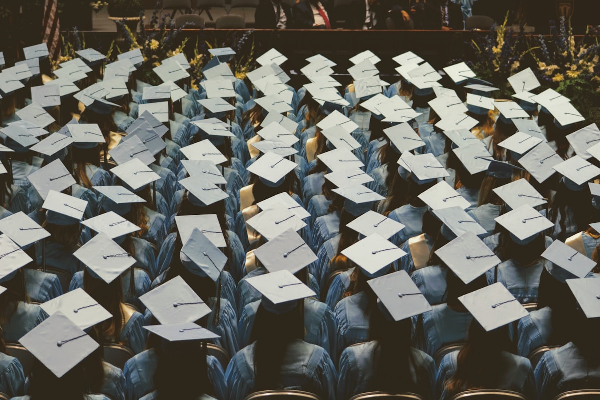Graduation cap with money representing scholarships