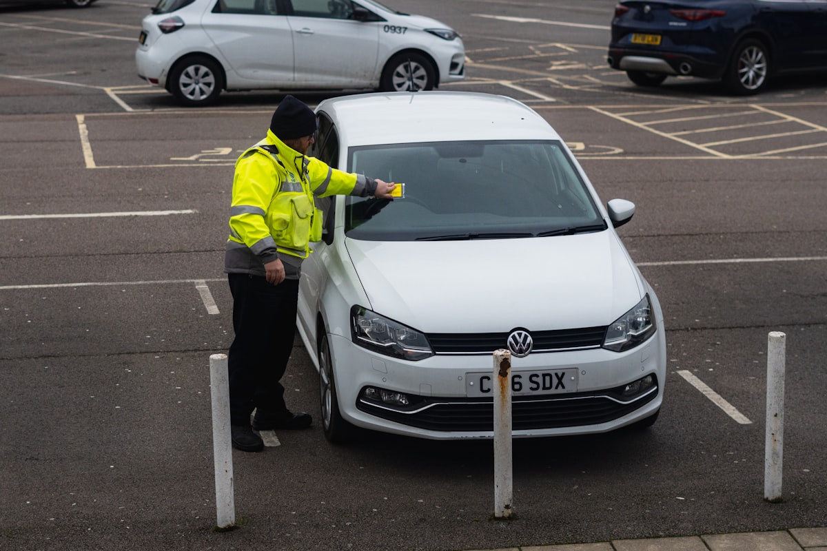 Traffic ticket on a car windshield