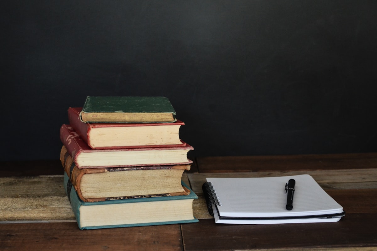 Study notes and books in a library setting