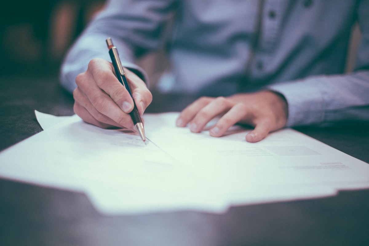 Signing a business contract agreement