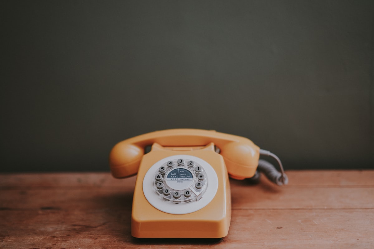 Phone ringing representing a debt collection call