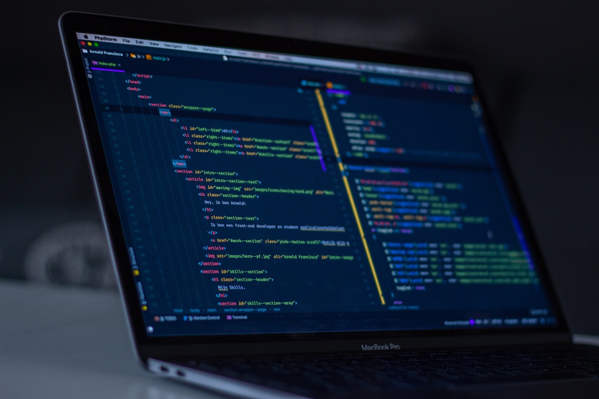 Laptop screen displaying lines of programming code