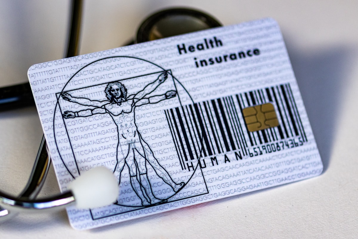 Health insurance card and medical stethoscope